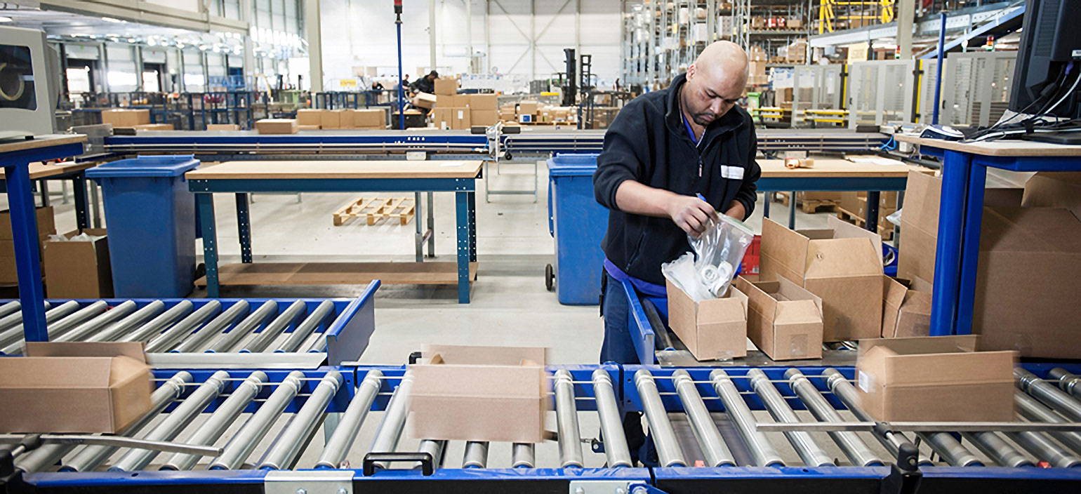 Photo of man working in manufacturing space